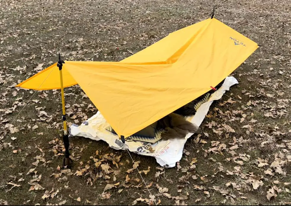 An example tarp shelter setup on a prairie in Texas