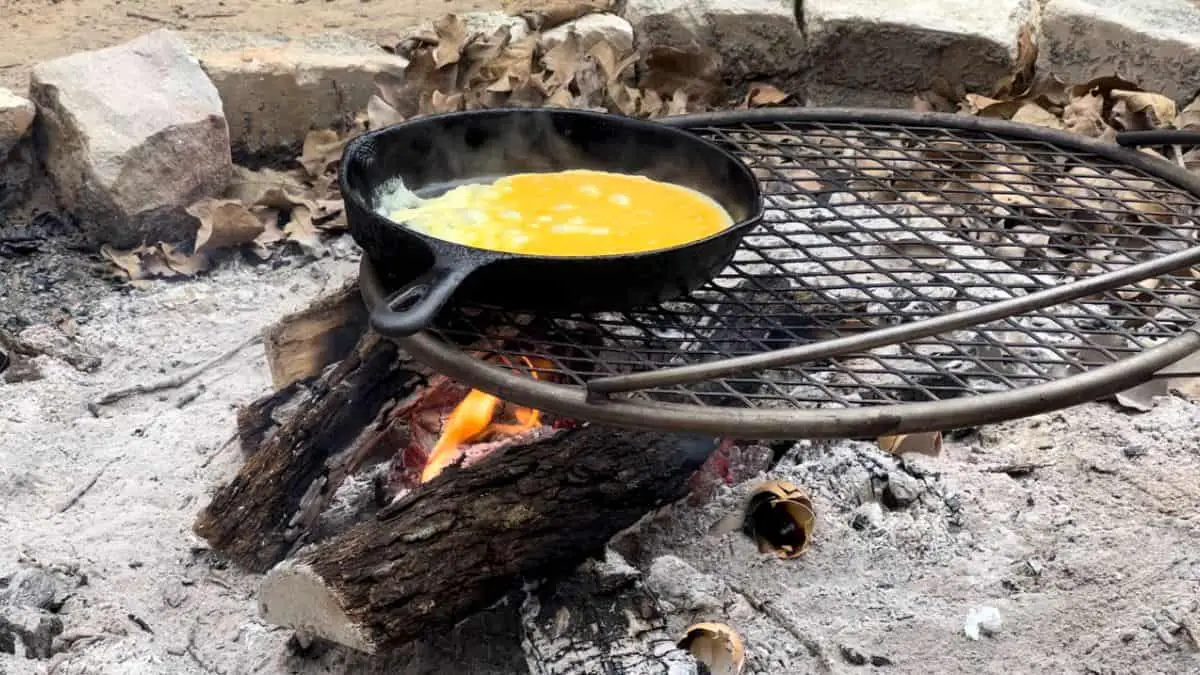 Cast iron skillet over a campfire