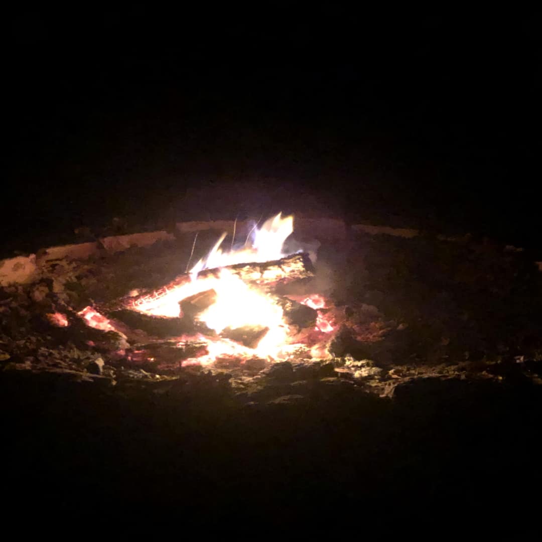 A campfire at night