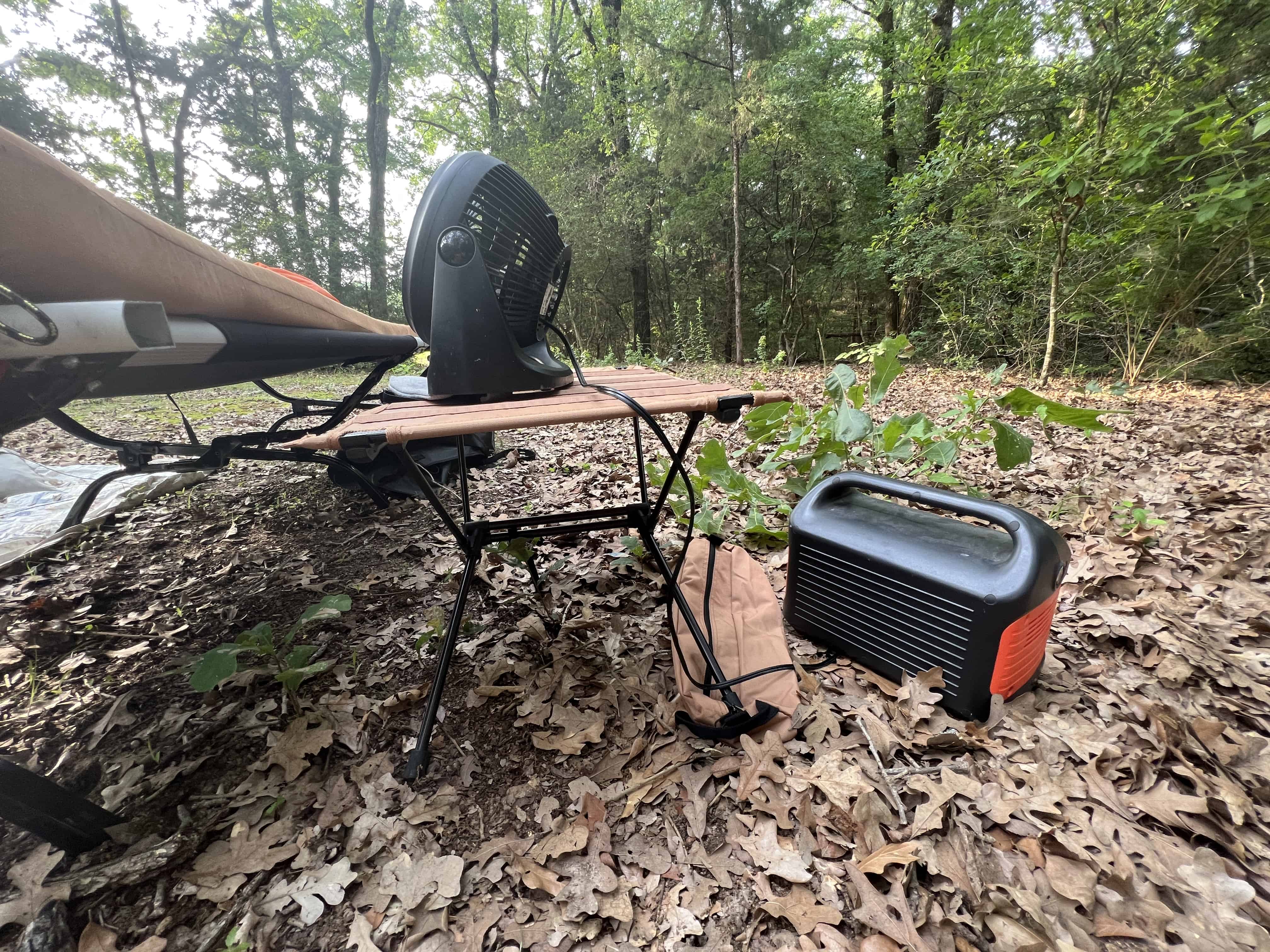 Photograph of a portable USB fan connected to a Jackery electric generator