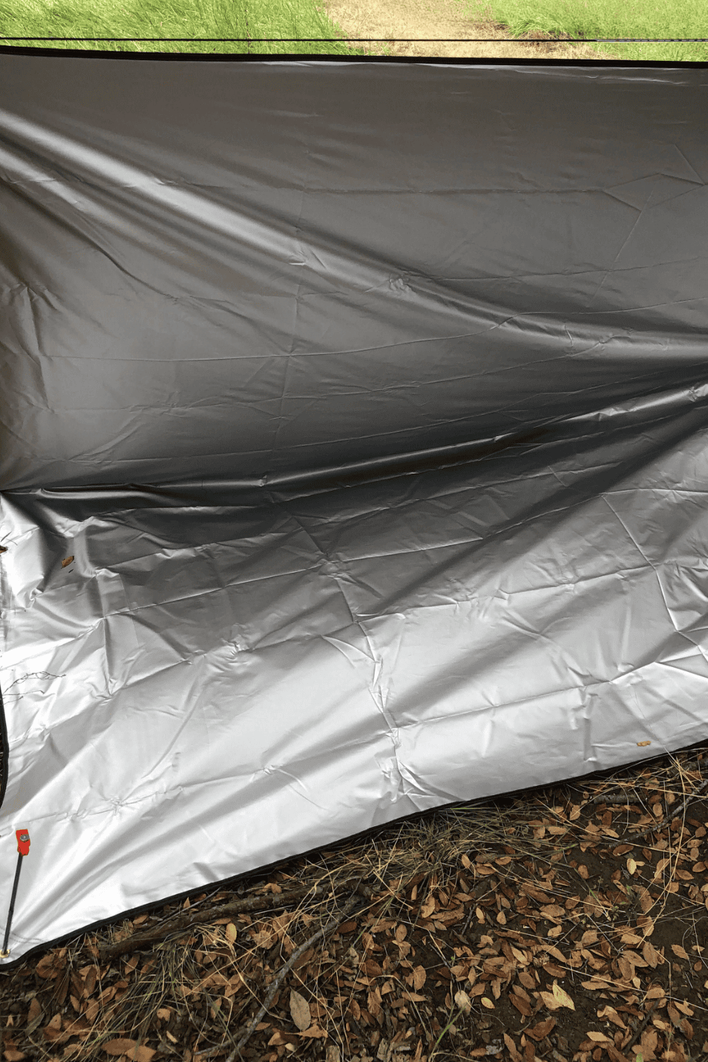 Photograph of a basic tarp shelter 