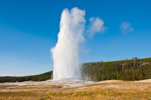 Visit Yellowstone National Park and see geysers like Old Faithful